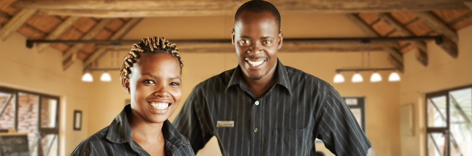 Two people smiling
