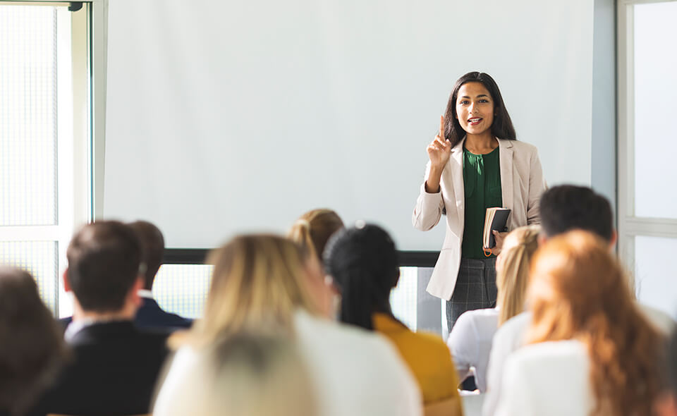 A woman giving a speech